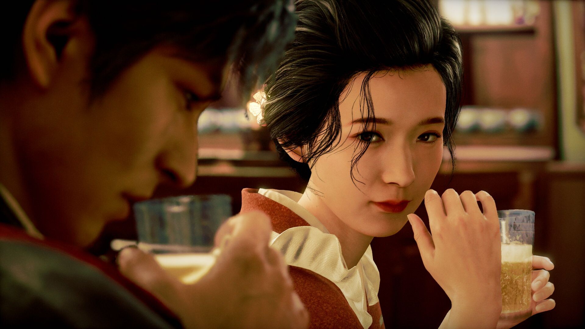 Two people sitting face to face in a bar